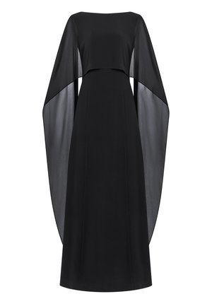Robe longue noire avec larges manches cape en voile transparent et corsage ajusté, s'écoulant en une jupe droite jusqu'au sol.