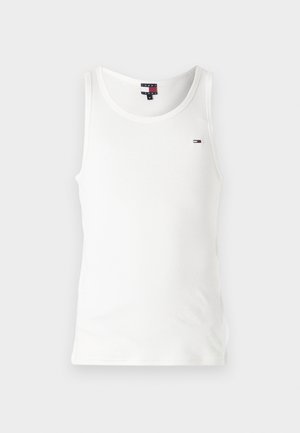 Hvit ermeløs tanktop med rund hals, liten Tommy Jeans-logo på venstre bryst, og størrelsesmerke medium inne i kragen.