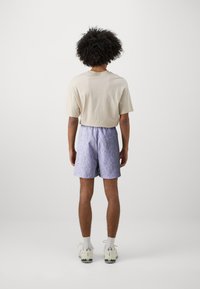 HUF INSTINCT EASY UNISEX - Šortai - purple