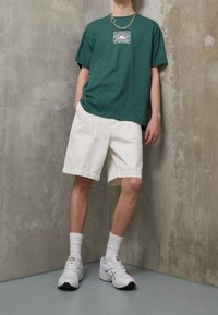 Ellesse T-shirt med print - dark green