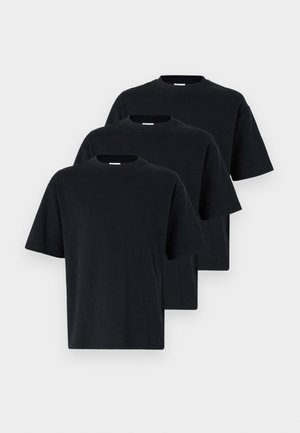 Three black cotton t-shirts feature a classic crew neckline, short sleeves, and a relaxed fit, displaying a smooth, solid texture.