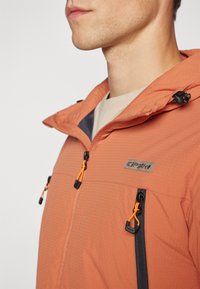 Icepeak YETTY - Lauko striukė - dark orange