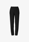 CHILLI - Pantalones deportivos - black