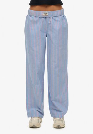 Jasnoniebieskie spodnie o szerokich nogawkach z różowymi pionowymi paskami, z elastycznym pasem i naszywką z logo na wysokości talii.