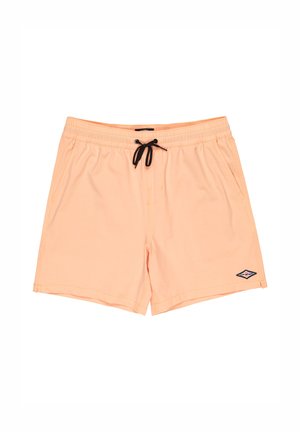 Ferskenfarvede badetights med elastisk talje, sort snøre, side lommer og et lille mærke nederst på venstre ben.