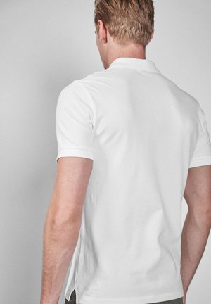 Next, Pólóing - white