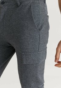 Studio Total Kapsáče - dark grey
