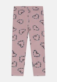 Rosa barneleggings med svart og hvit blomsterhjerte-mønster spredt over stoffet.