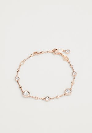 Roze gouden armband gemaakt van delicate kettinglinks met ronde heldere kristallen in ronde zettingen, met een kattenhaaksluiting.