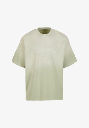 T-shirt à manches courtes, col rond, en coton vert clair avec un design dégradé. Présente un texte brodé ton sur ton sur le devant.