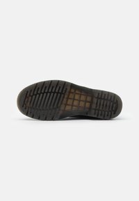 Dr. Martens Stivaletti stringati - black