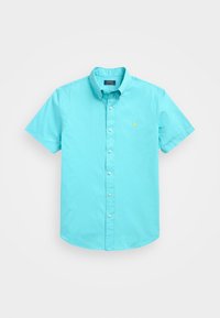 Turkos kortärmad skjorta med knappar och krage, med en liten gul logotyp och en mjuk bomullstextur.