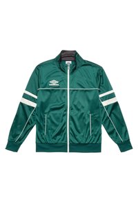 Grön träningsjacka i mjukt, glänsande material. Har dragkedja framtill, hög krage, vita ränder på ärmarna och sidofickor.