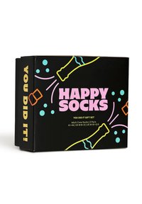 Black gift box with bright graphic designs, featuring the text "HAPPY SOCKS" and illustrations of champagne bottles and confetti.