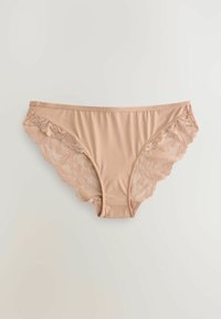 Meztelen női bikini alsó, sima anyaggal és bonyolult csipke díszítéssel az oldalán, fodros szélekkel.