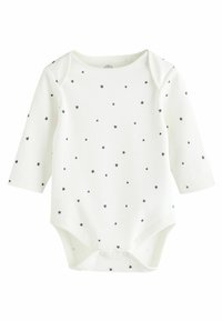 Body à manches longues blanc pour bébé avec un petit motif d'étoiles noires et des boutons-pression en bas. Fabriqué en matériau en coton doux.