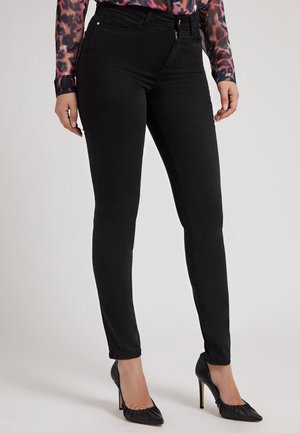 SKINNY - Trousers - schwarz