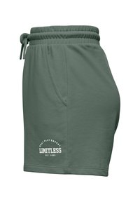 Groene katoen shorts met een elastische tailleband, zijzakken en een bedrukte logo met de tekst "ONLY PLAY ENERGY LIMITLESS EST. 2006."