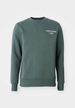 Tmavozelená mikina s okrúhlym výstrihom, na ktorej je na ľavej hrudi biele písanie "BJÖRN BORG STOCKHOLM 1956", s rebrovanými manžetami a spodným lemom.