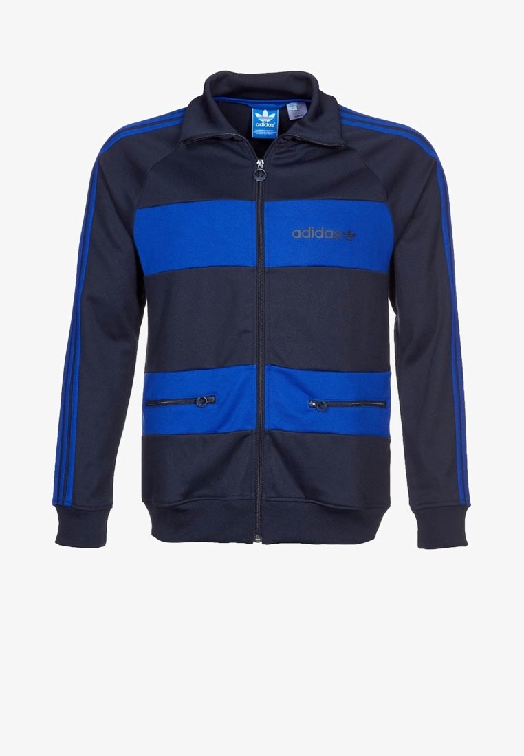 Men's zip-up jacket in navy polyester with blue horizontal stripes. Features embroidered logo, zippered pockets, and ribbed cuffs.