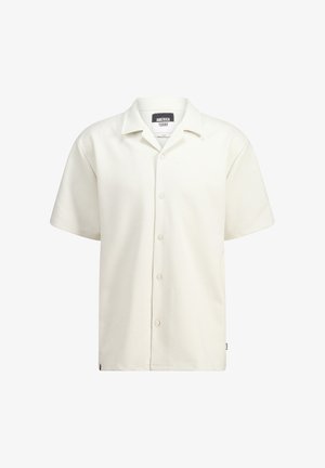 Korte mouwen, crèmekleurig shirt met een textuurpatroon, knoopsluiting aan de voorkant en een klassieke kraag. Merkenlabel zichtbaar in de halslijn.