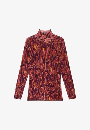 Long-sleeve turtleneck top in a floral pattern with shades of purple, orange, and pink. Texture appears soft with a fitted design.