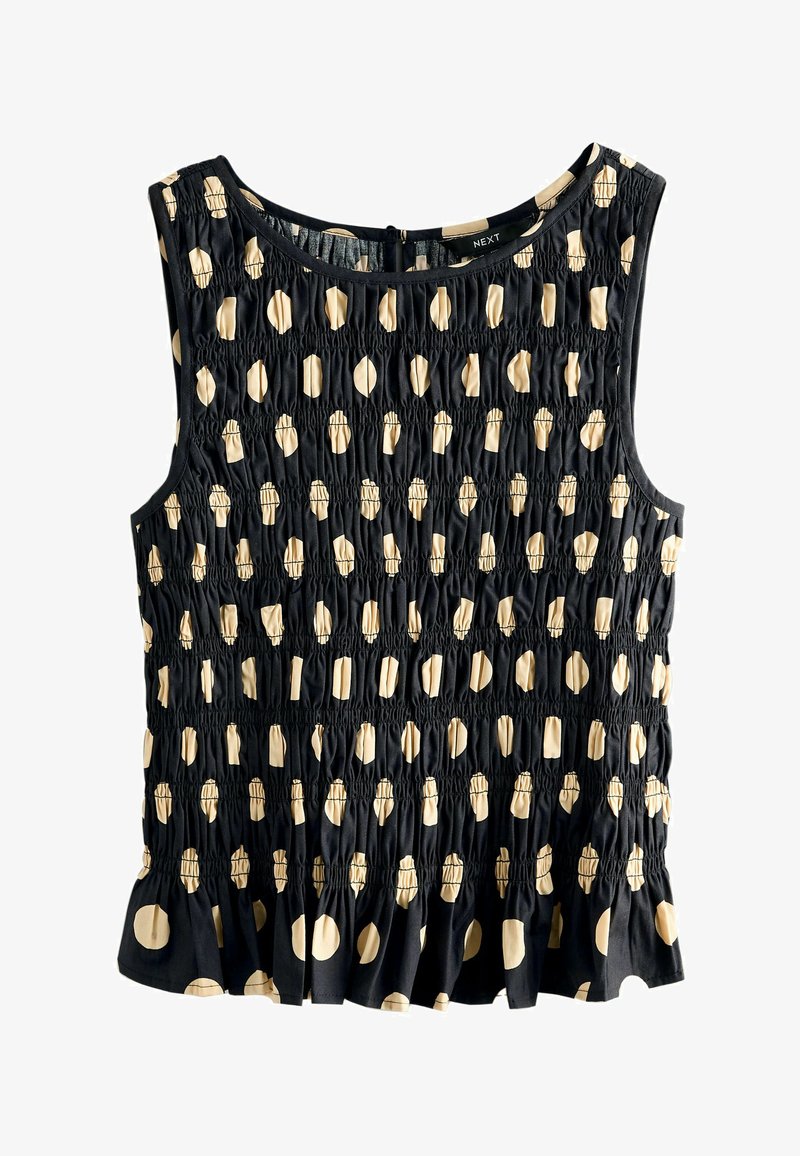 Top noir sans manches avec tissu froncé, motif abstrait ovale et circulaire beige, et léger volant à l'ourlet, étiquette « NEXT » à l'intérieur du col.
