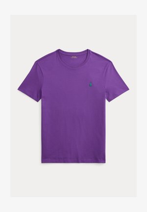 Purple cotton t-shirt with short sleeves, a crew neck, featuring a small green embroidered logo on the left chest. Smooth texture, relaxed fit.