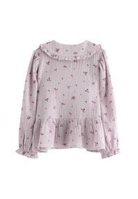 Blusa a maniche lunghe in tessuto testurizzato rosa chiaro con motivo floreale; presenta un colletto arricciato e un bordo peplum.