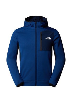 Donkerblauwe hoodie met ritssluiting aan de voorkant, elastische manchetten en een borstzak. Heeft een gladde stof en contrasterende zwarte accenten.
