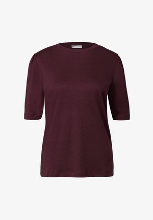 T-shirt bordeaux à manches courtes en tissu doux. Il présente un col rond et des manches légèrement froncées pour une touche supplémentaire de détail.