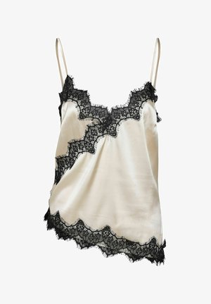 Kreemjas satiinist kamisol õhukeste rihmadega, kaunistatud musta lillelise pitsi lainelise äärega kaelusel, esi- ja ääreserval.