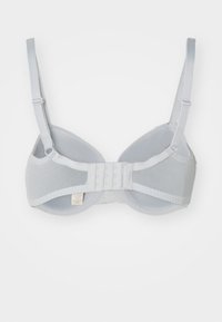 Reggiseno grigio chiaro realizzato in tessuto liscio, con spalline regolabili e chiusura a gancio e occhiello sul retro. Coppe morbide con dettagli in rete.