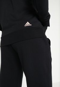 adidas Performance Felpa con zip - black