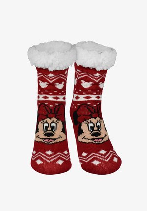 Calze rosse di maglia con bordo in pile bianco, con un motivo grafico del volto di un personaggio. Decorate con cuori bianchi e motivi a zigzag.