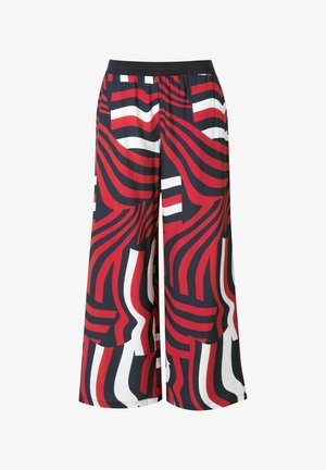 Pantalons larges en tissu léger dans des tons de bleu marine, rouge et blanc avec des motifs de vagues abstraits. Dispose d'une taille élastique pour plus de confort.