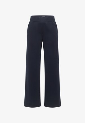 Granatowe spodnie o szerokich nogawkach wykonane z miękkiego materiału, wyposażone w elastyczną talię i boczne kieszenie dla praktycznego użytkowania.