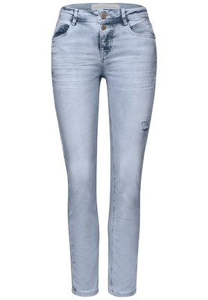 Hellblaue Skinny-Jeans mit verwaschenem Look, leichter Used-Optik am rechten Oberschenkel, Vorderentaschen und doppeltem Knopfverschluss an der Taille.