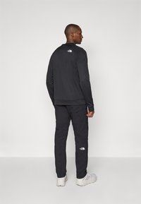 The North Face WINTER EXPLORATION TAPERED CARGO  - Hlače za na prostem - black