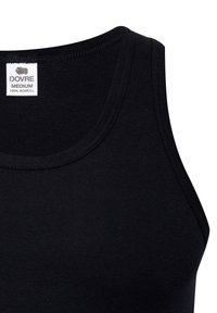 Sort bomulds tanktop med rund halsudskæring, ribbet struktur og ingen synlige mønstre. Etiketten står "DOVRE MEDIUM 100% BOMULL."