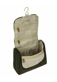 Hangende make-up tas in olijfgroen, met meerdere ritszakken, gaascompartimenten en een haak voor gemakkelijke opslag. Textuur stof.
