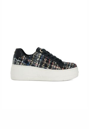 Low platform sneaker with black multicolor tweed upper, black laces, and thick white sole.