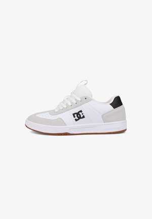 White and gray sneaker with a suede and mesh upper, featuring a black logo, round laces, and a brown rubber sole.