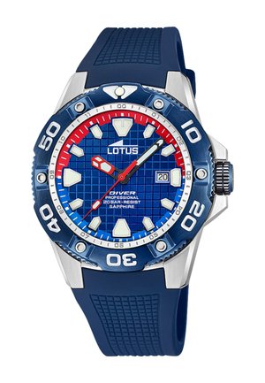 Montre de plongée bleue avec un bracelet en caoutchouc, des accents en acier inoxydable, un cadran à motif en grille, des index lumineux et un affichage de la date à 3 heures.