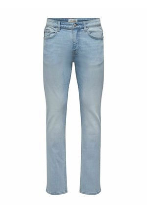 Svetlomodré úzke rifle so zapínaním na gombíky, pútkami na opasok, prednými a zadnými vreckami a jemným vyblednutím na stehnách.