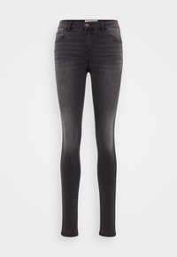 Sorte skinny jeans i denim, med klassisk fem-lommers design, glidelås og en lett falming på bena. Glatt tekstur.
