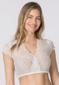 Weiße Spitzen-Bralette mit kurzen Ärmeln, floralen Mustern, V-Ausschnitt und strukturiertem Saum. Leicht und figurbetontes Design erhöht den Komfort.