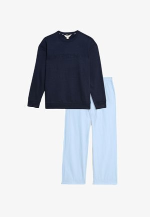 Granatowy sweatshirt z wytłoczonym napisem "WEEKEND", zestawiony z jasnoniebieskimi spodniami. Oba wykonane z miękkiego materiału w luźnym kroju.