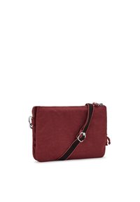 Kipling RIRI - Axelremsväska - flaring rust