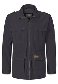 Dark navy fabric jacket with a zip front, two chest pockets, and two lower flap pockets. Features shoulder epaulettes and a logo patch.